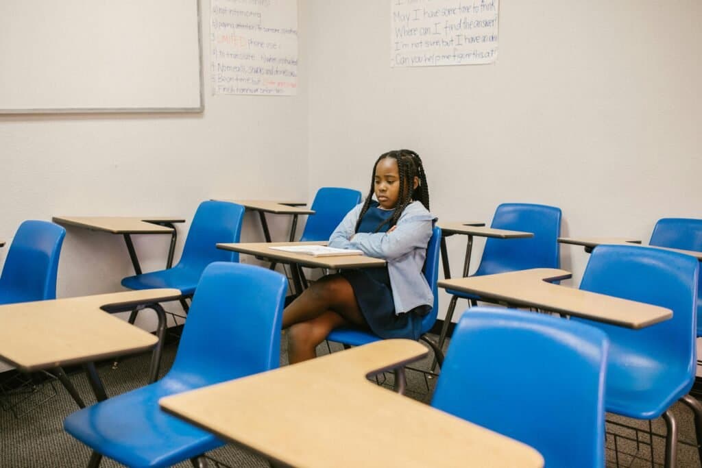 An unmotivated child showing a lack of motivation in school.