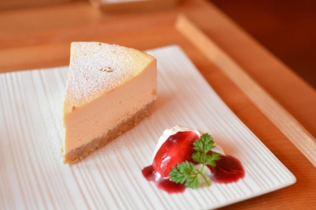A delicious slice of a traditional South African easy milk tart on a plate, ready to be eaten