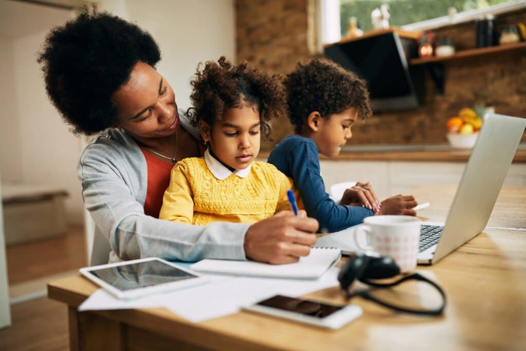 Parent - reviewing - homeschool - schedule - ideas - with - child